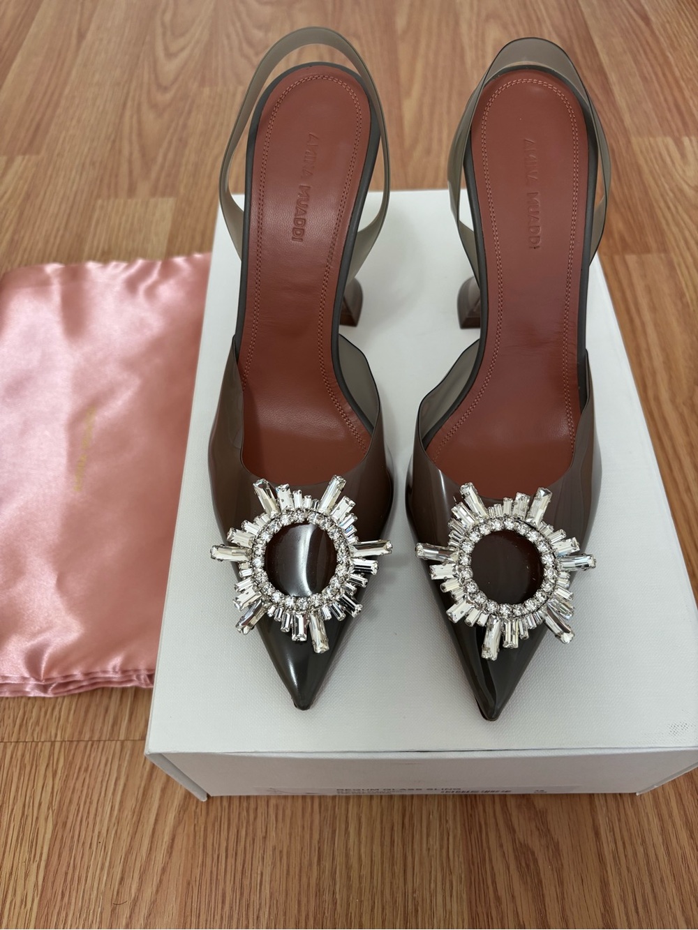 Amina Muaddi Brown Patent Slingback Pumps with Crystal Sunburst